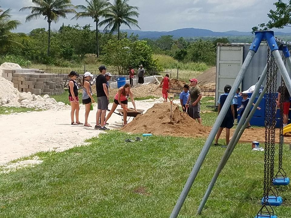 volunteers shoveling dirt volunteers shoveling dirt